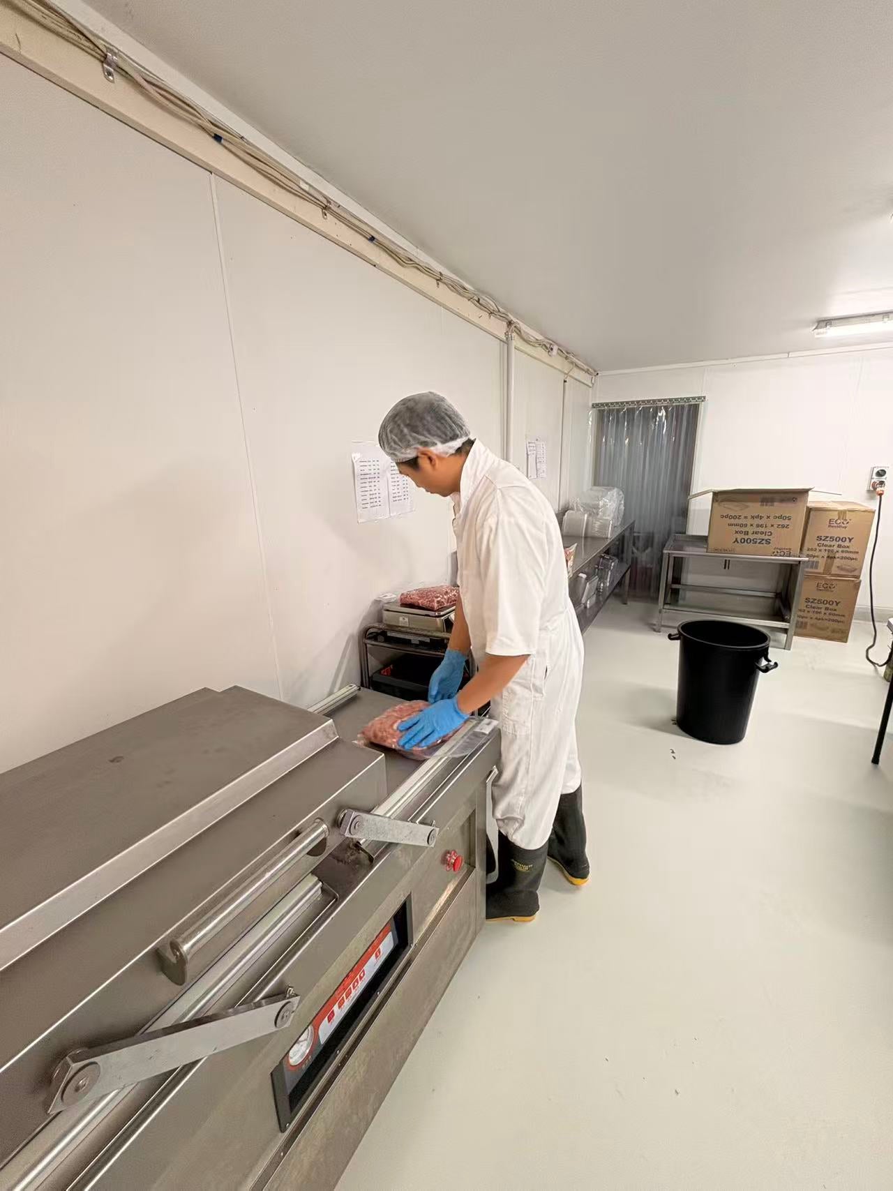 Sun Foods team processing and vacuum packing meat to order